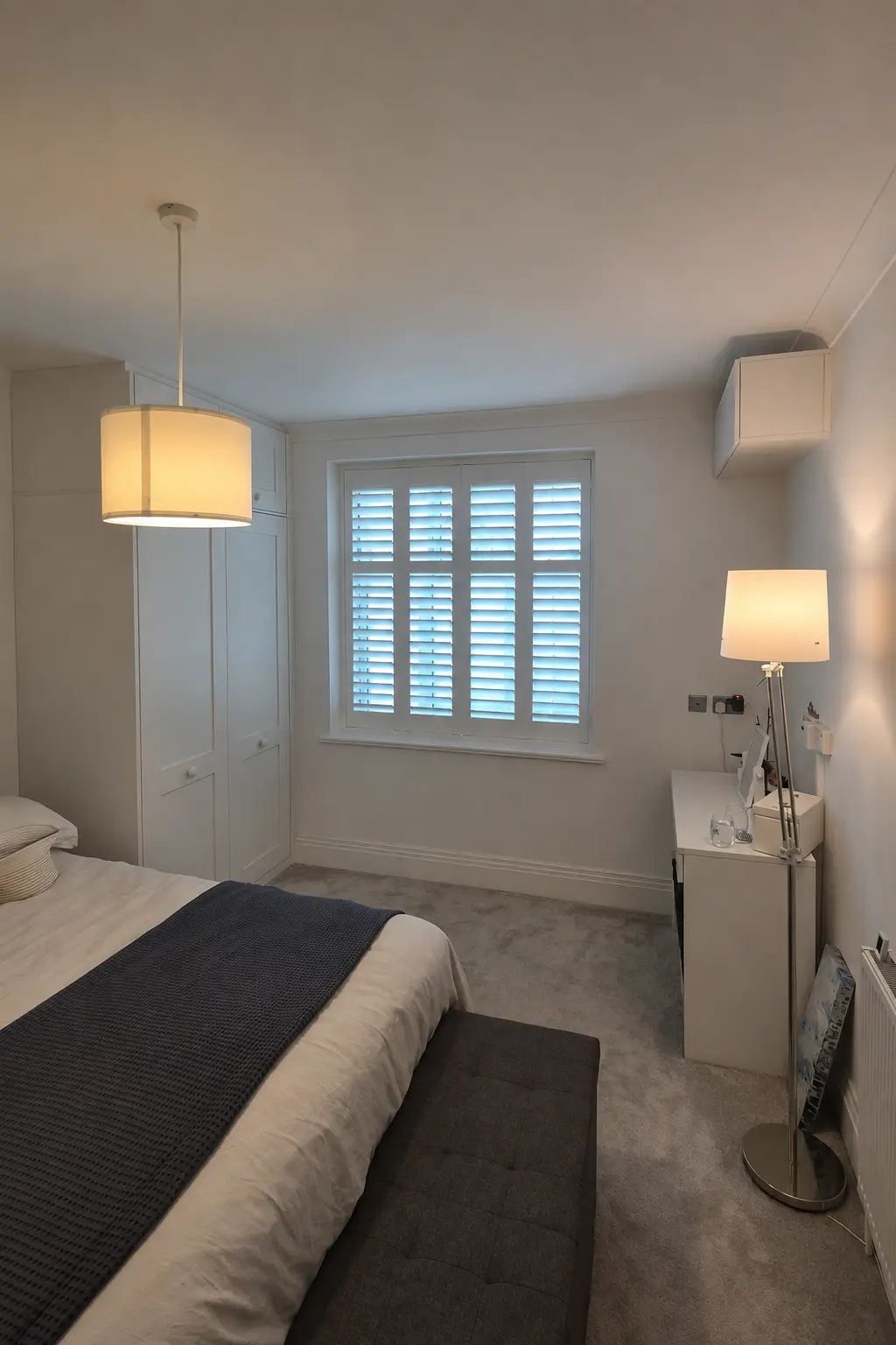 Made-to-measure plantation shutters in a bedroom
